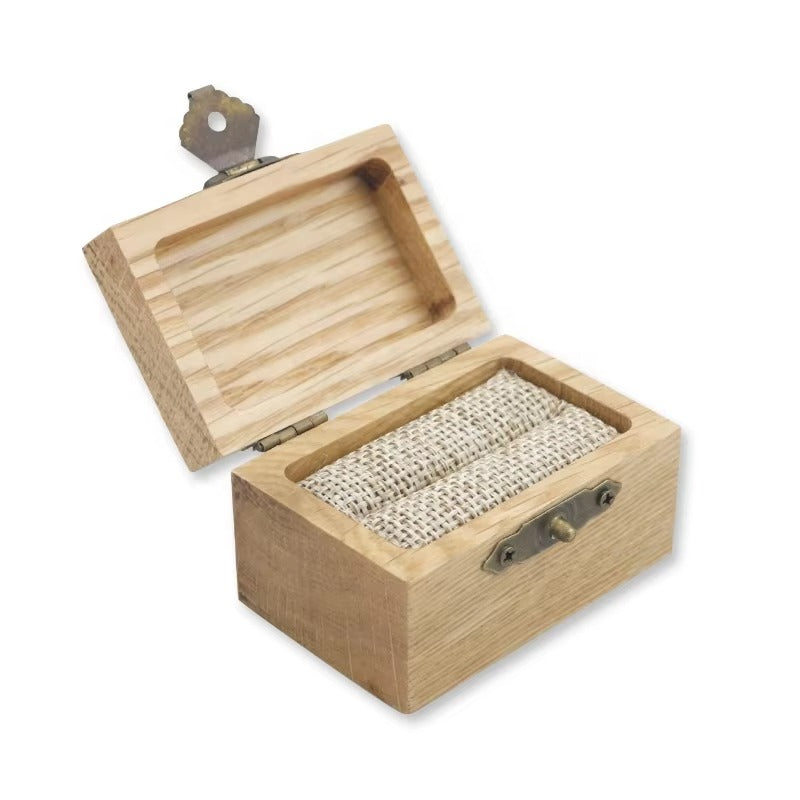 Personalized whiskey barrel wood ring box with custom engraving.